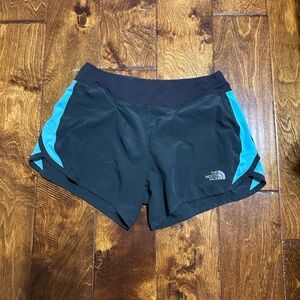 The North Face Black and Blue Athletic Shorts Moisture-Wicking Design